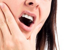 Nên làm gì khi bị ê buốt răng sau khi nhổ răng khôn?