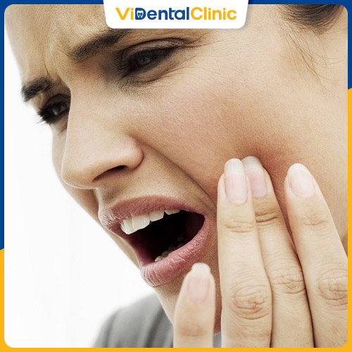 Nướu chưa kịp thích nghi sau khi bọc răng sứ gây đau nhức